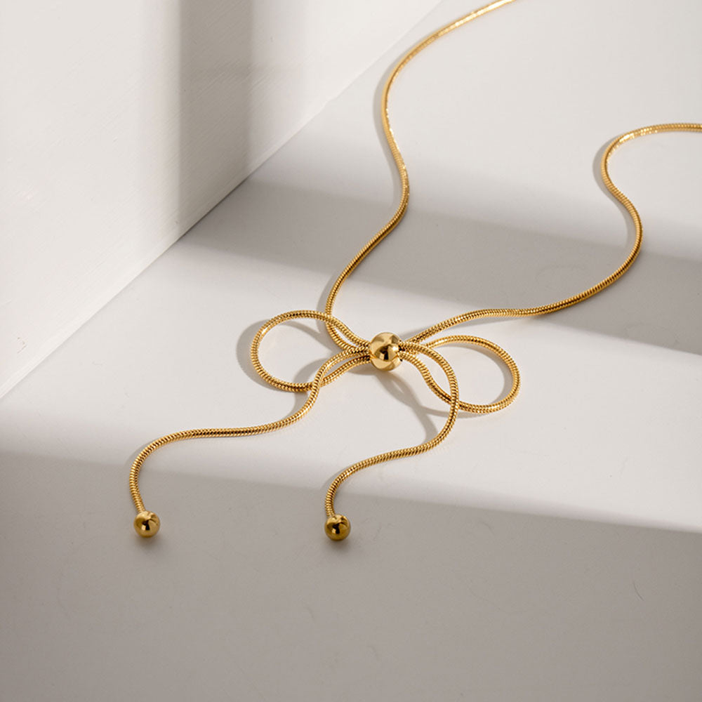 NUEVO - Cadena Dulce Encanto en Acero Inoxidable Estilo Bow Bañado en Oro