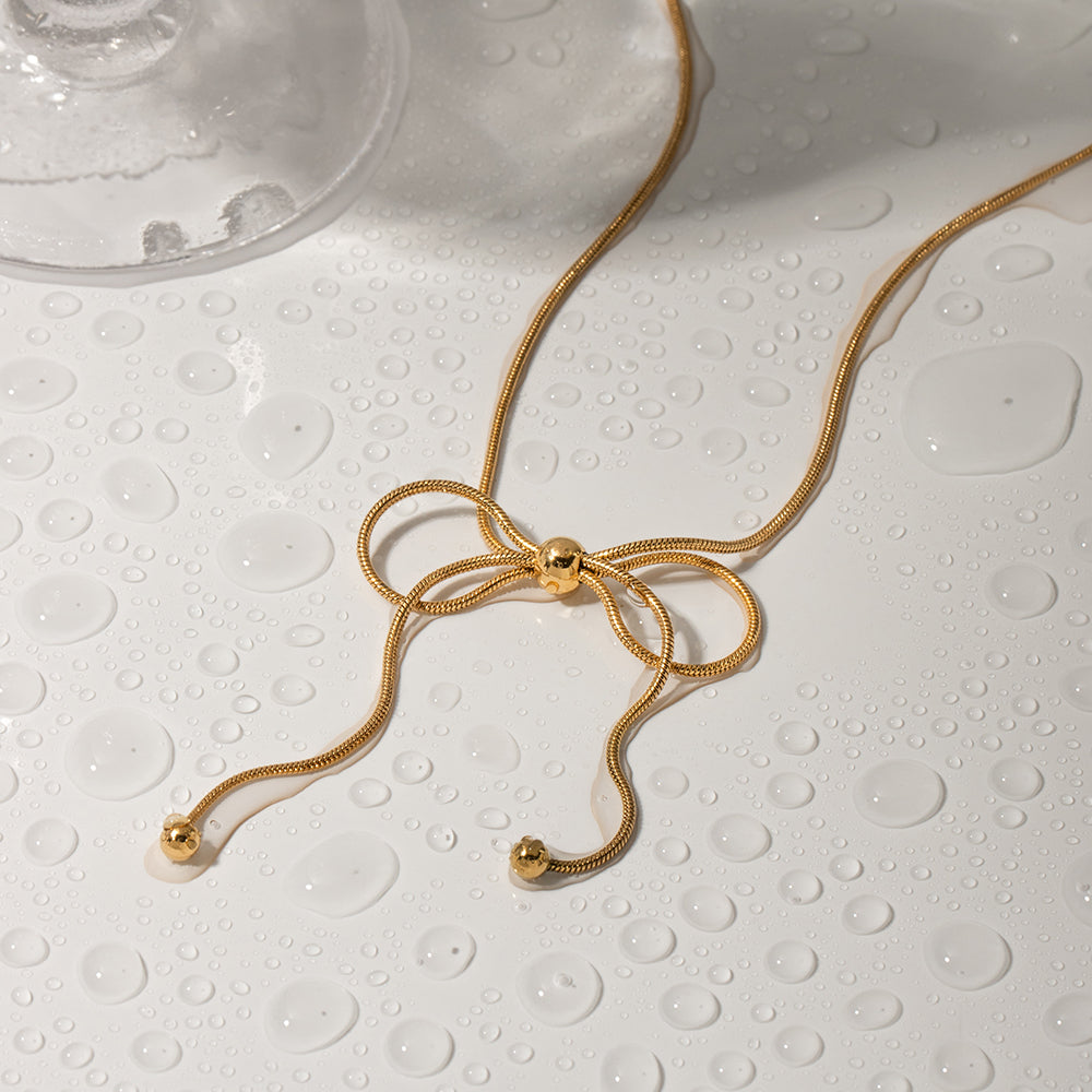 NUEVO - Cadena Dulce Encanto en Acero Inoxidable Estilo Bow Bañado en Oro