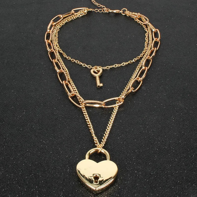 NUEVO - Collar Corazón Candado Dorado con Llave de 50 cm.