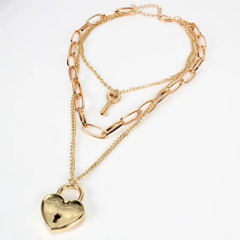 NUEVO - Collar Corazón Candado Dorado con Llave de 50 cm.