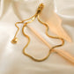 NUEVO - Golden Temptation: Collar Corazón Dorado de Acero de Titanio 18K