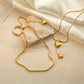 NUEVO - Golden Temptation: Collar Corazón Dorado de Acero de Titanio 18K