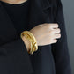 NUEVO - Brazalete Radiante Dorado Estilo Atemporal